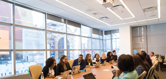 Board members sitting at large table