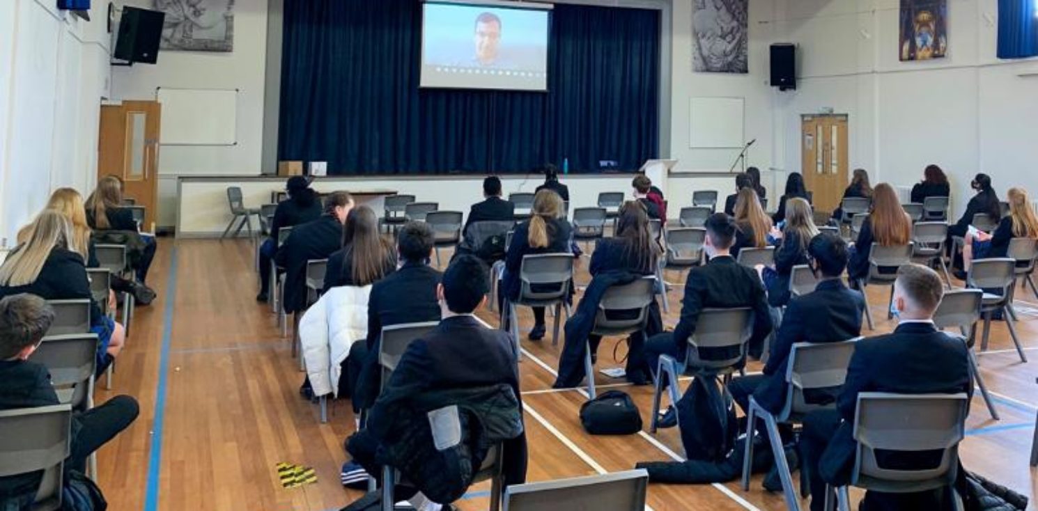 Kids in school assembly hall