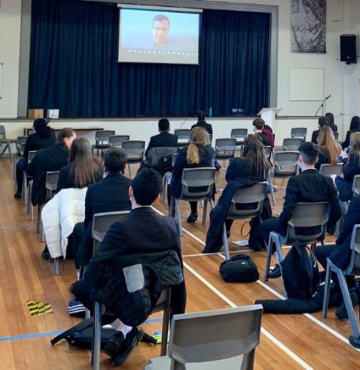Kids in school assembly hall