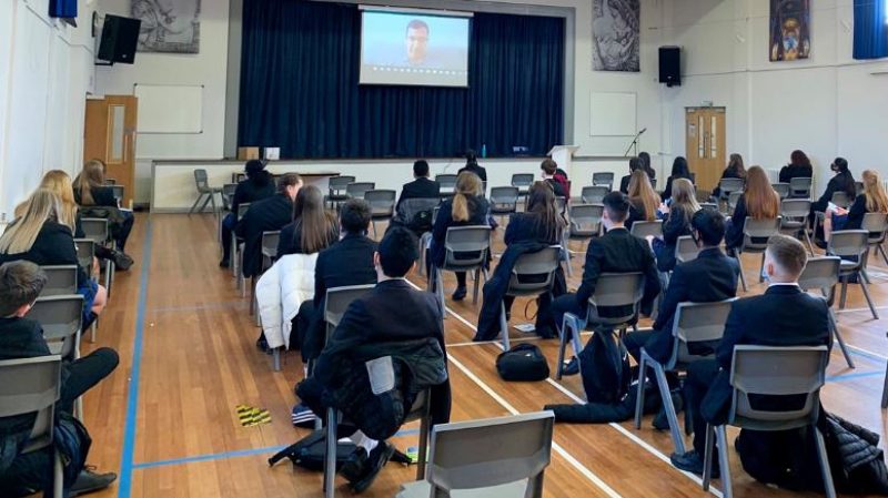 Kids in school assembly hall