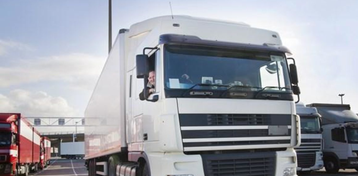HGV and driver at terminal