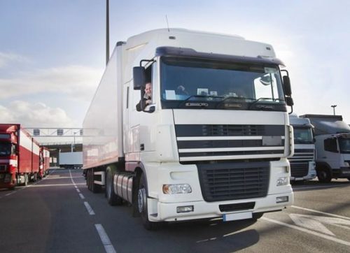 HGV and driver at terminal
