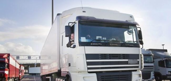 HGV and driver at terminal