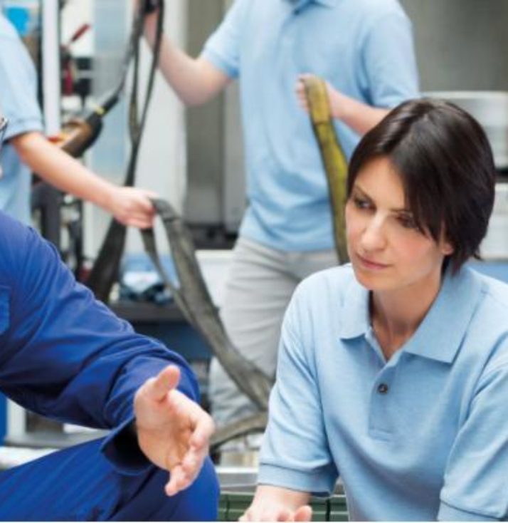 Engineer with apprentices