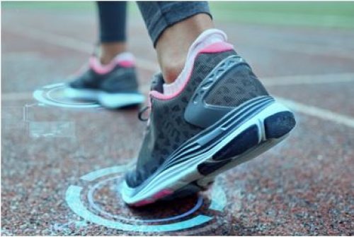 A picture of some running shoes at a starting line in a race